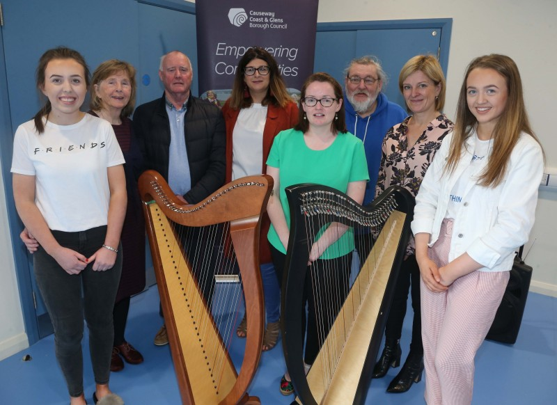 Committee members from the Magilligan Community Association pictured with harpists Dervla and Laura Bradley at the official opening of the new community centre in Magilligan.