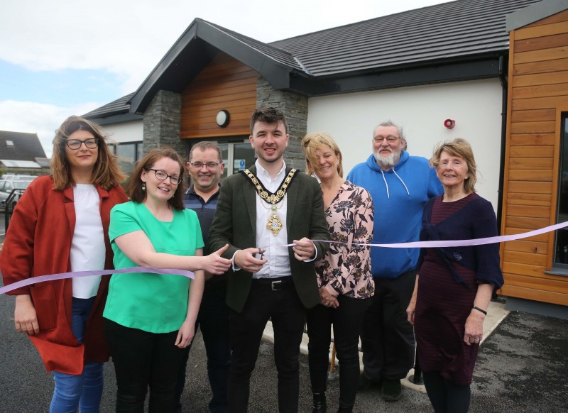The Mayor of Causeway Coast and Glens Borough Council Councillor Sean Bateson pictured with members of Magilligan Community Association at the official opening of the new community centre.