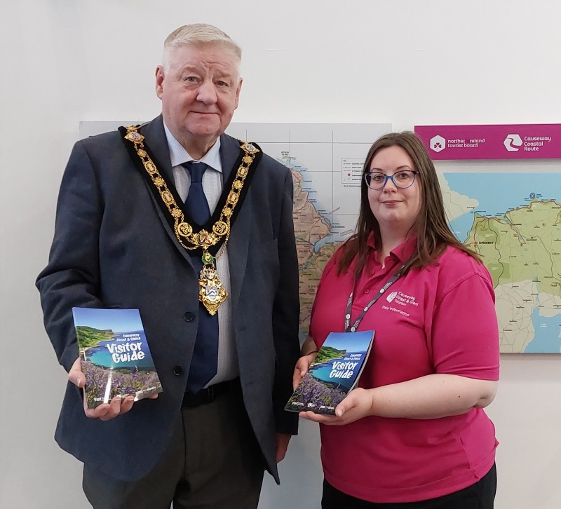 The Mayor of Causeway Coast and Glens, Councillors Steven Callaghan pictured alongside Gina Doherty from Council’s VIC team as staff prepare to open seasonal VICs for the new season.